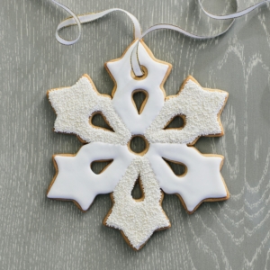 Martha: Harvest + Holiday 2022 offers lots of fun project inspirations, such as these giant eight-inch Snowflake Sugar Cookies. If you're an avid baker, make these to hang on the window for a wintry and festive effect.