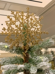 One can also top a tree using one of my 12-inch Round Petaled Snowflakes. When decorating, consider using consistent themed color palettes. At The Bedford this year, we used all gold, Champagne, and silver.