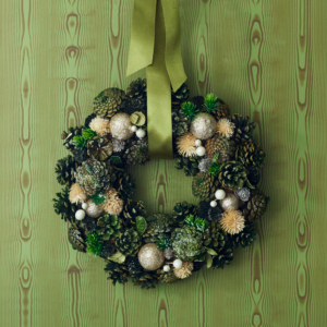 But if you're looking for classic, here's my Faux Pine Cone & Ornament 13-inch Wreath. Glittering ornaments and frosted pine cones are paired to create a highly textural wreath with festive charm inside and out.
