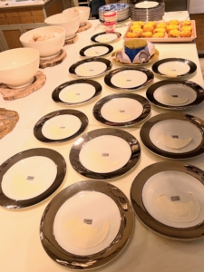 In my kitchen, all the limoges dinner plates were set out on the counter ready for the first course.