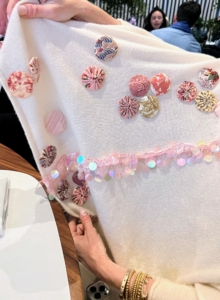 Right away, everyone admired Judy's sweater - bedecked in fun sequence and button rosettes. It was designed by my neighbor, Andy Yu, and bought at the Village Winter Market in Bedford, New York - did you see my blog on the two-day event?