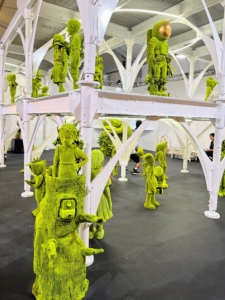 We all admired this installation from Jason Jacques Gallery featuring Moss Children by Kim Simonsson and a scaffolding set up by Urban Umbrella. The green epoxy-covered and flocked clay figures are positioned atop, beneath, besides, and around the scaffolding.