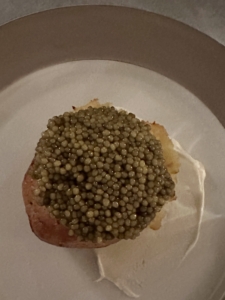 At dinner, the potatoes were served with crème fraîche and each of us spooned dollops of caviar on top.