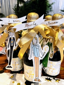 Darcy Miller Nussbaum, who worked with me as Editorial Director of Martha Stewart Weddings for many years, is now a celebrations expert and entrepreneur. She brought everyone a bottle of champagne tagged with her creative illustrations of each of us. This is mine. Follow Darcy on Instagram @darcymiller.