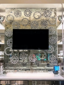 Around this monitor, we filled the glass wall with large 12-inch Round Petaled and Stellar Snowflakes. They make wonderful decorations - not just on a tree, but all around the home.