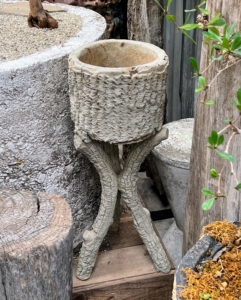 And in this corner, a smaller vintage faux bois planter on a faux bois stand. In Mexico and Texas, this style is sometimes known as "el trabajo rústico" meaning the rustic work.