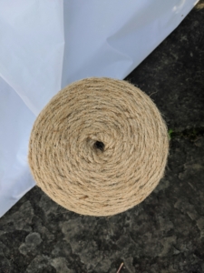To sew the burlap, we use jute twine. It is all natural and the same color as the burlap.