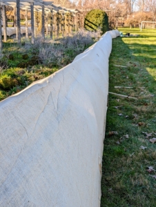 Here is one side all done – it looks great. Any snow that falls will just slide off the burlap cover.