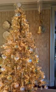 In my adjacent sitting room, a beautiful gold tree filled with ornaments and lights. Many of these ornaments are also from my collections on QVC and at Martha.com.