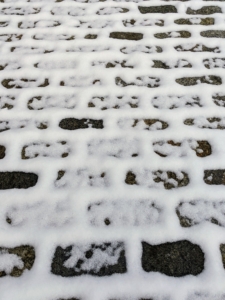 And the cobblestones in the courtyard outside my stable are also coated with snow - light, powdery snow. It did not take long before it melted away.