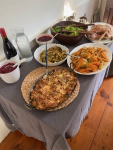 Their feast also included Gruyère and pancetta stuffing, sweet potatoes and yellow potatoes with peas and onions, Brussels sprouts, salad, and cranberry sauce. Not shown - their carrot ginger soup and dessert which included apple pie and several pumpkin pies. It was a delicious day!