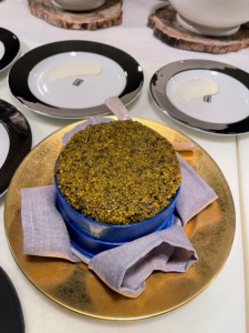 And here is a large container of golden Osetra caviar. Osetra caviar ranges from golden to brown and comes from the Osetra sturgeon, which weighs 50 to 400 pounds and can live up to 50 years.