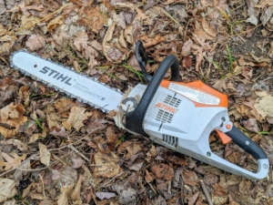 He uses this STIHL battery operated chainsaw. This tool uses a strong 36-volt Lithium-Ion battery. It is significantly quieter than the gasoline-powered chainsaws and starts instantly with the squeeze of a trigger.