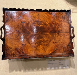 This is a fine and very rare George III Yew Wood Tray English, provincial c. 1780 also shown by Michael Pashby Antiques. Last year, I had a large table made out of a yew tree that was cut down at my former East Hampton, New York home. Yew wood, Taxus Baccata, is a species of evergreen tree in the conifer family. Yew is native to Western, Central, and Southern Europe, Northwest Africa, Northern Iran, Southwest Asia, and is also known as common yew, European yew, and English yew.