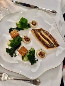 This is Montauk black sea bass, with broccolini, bottarga-potato “croquette”, Buddha hand lemon emulsion, and pine nut gremolata.