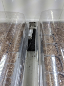 Here, one can see where the water comes out from the back of the Urban Cultivator. Each spout also has a water sensor, so the machine does not overflow.