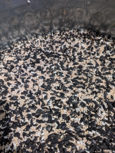This is a wild bird seed mix. This includes white millet, black oil sunflower seeds, striped sunflower seeds and cracked corn. The birds love this seed.