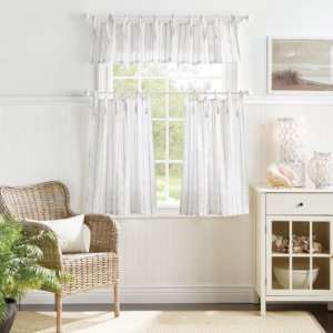 For the windows, this is my Laguna Stripe Semi-Sheer Tie Tab Window Curtain Valance and Tier Set. These window coverings are yarn-dyed with tie tab curtain panels from my Lily Pond Coastal Window Collection.