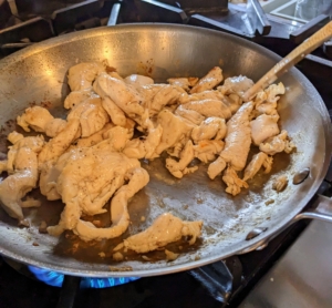 Here is the chicken almost cooked - always make sure poultry is cooked through. To be sure, one can poke the chicken to see if the juices run clear. If they do, it's done.