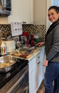 Here's Stephanie after finishing the mis en place - a French culinary phrase which means "putting in place" or "gather" all the ingredients required before cooking.