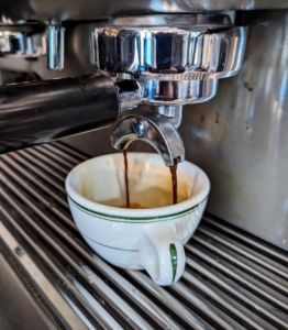 A double shot uses 14 grams of coffee and produces around 60 milliliter of espresso.