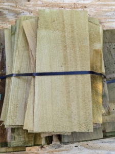 Here are some of the Alaskan yellow cedar roof shingles before they were used on my Tenant House. Alaskan yellow cedar shingles are fine textured, light in color, and moisture tolerant.