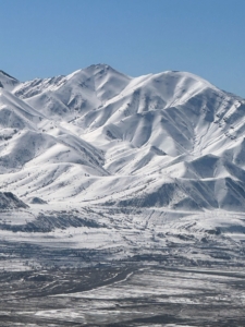 Snow-capped mountains could be seen for miles. Among the many mountains in the region, the tallest mountain found within the Salt Lake City boundaries is Grandview Peak, which rises 9,410 feet above sea level. In comparison, Salt Lake City sits at an altitude of around 4,200 feet above sea level.