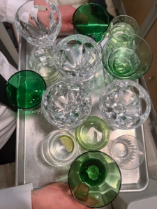 Here are some of the glasses being taken away after dinner. Using a variety of different glasses adds vibrant color to the table - experiment. I try to make my table look a little different each time.