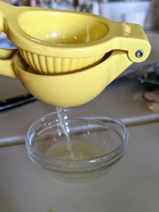She also uses my own citrus press to squeeze two tablespoons of lemon juice into a separate bowl.