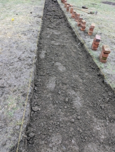 Earlier this month, I decided I wanted to create proper footpaths inside my bird pens. Doing this would look neat and tidy, but also provide good, sturdy, and hopefully dry footing for anyone who enters the enclosures. Here, the sod was removed from a path in front of the goose pen to the front of the peafowl pen - it measures 36-inches across.