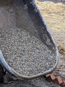 And then the gravel on top of the stone dust. All around the farm, I like to use quarter-inch native washed stone. Each stone is about the size of a pea. This same gravel stone is also used to line the paths in my flower cutting garden. It s nice to keep everything uniform when possible.