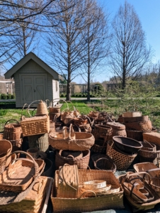 In one corner of of this garden behind my Tenant House, nestled within a grove of tall bald cypress trees is my Basket House. It stores all these beautiful and very useful baskets.