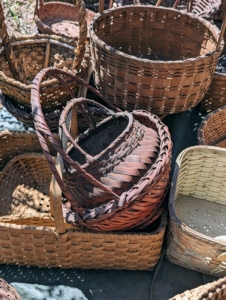 Early basketmakers selected materials from nature, such as stems, animal hair, hide, grasses, thread, wood, and pinstraw. Baskets vary not only across geographies and cultures, but also within the regions in which they are made.