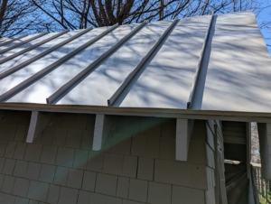 Here is a section done - its thin distinctive ribs and wide panels give the roof a more modern look.