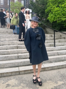 Here I am in my “hat luncheon” ensemble. I always wear one of my own hats for the affair. I chose this old fedora and wore it with a Carolina Herrera by Wes Gordon coat and Prada shoes.