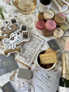 I always appreciate Darcy’s attention to detail—her art is on the macarons, the cookies, the matchboxes, and even the custom confetti on the table.
