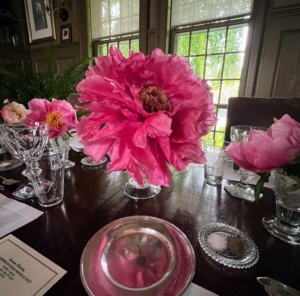 And if we can, we always try to incorporate some freshly cut flowers from my gardens. These are some of the first herbaceous peonies to bloom this season. These bold pink blooms were cut just hours before guests arrived and then placed in small glass vessels the entire length of the Brown Room dining table – it looks so cheerful and inviting.
