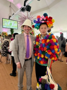 Here - Christopher and my neighbor, fashion designer Andy Yu. Andy always creates his own looks. This hat, top, and bag were made from recycled items.