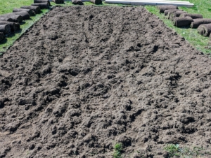 Here is the soil of one beds completely rototilled. A rototiller can help break up soil and turn it over for fresh planting. It is also good for working in compost and other soil additives.