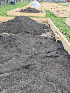 And the bags of soil were emptied into the beds.