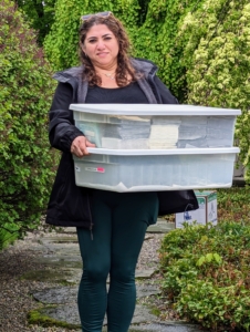 And here's Enma carrying just one of the many bins of supplies and items needed for this first big spring gathering.
