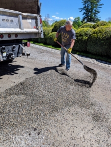 Afterward, Fernando spreads a new layer of gravel around the stable, leveling the road and filling in any bare spots. I like to use native washed stone in a blend of gray tones.