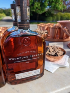 The Woodford Reserve Bourbon is set on our mint julep table where I will later do a demo making my rendition of the popular cocktail.