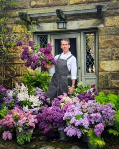 Every time I go up to Maine, Kevin Sharkey always creates the most gorgeous flower arrangements. Here he is with all the lilacs cut and ready to arrange – the fragrance of all these blooms is intoxicating.
