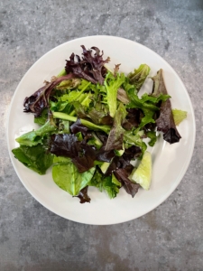 And a delicious garden greens salad with a light vinaigrette dressing.