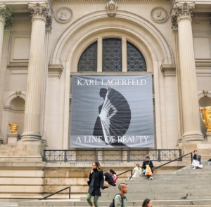 Karl Lagerfeld: A Line of Beauty is among the many wonderful exhibitions now on view at The Metropolitan Museum of Art located along Manhattan's Fifth Avenue Museum Mile. Banners of some of the current presentations are always displayed above the iconic front steps of The Met. (Photo by BFA.com/Angela Pham).