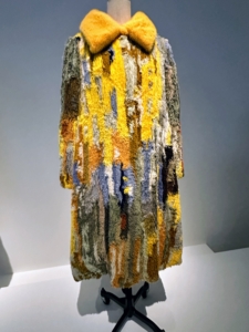 This colorful coat is from Fendi, autumn/winter 2018–19 FENDI couture. Karl was such a talented designer - he could make any piece of fabric fashionable.