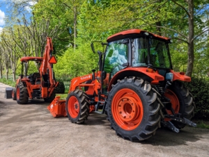 I am very fortunate to have two tractors - the M4-071 and the M62. Both of them have front loaders, and one of them is equipped with a backhoe.