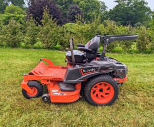 Kubota also makes excellent mowers. Here's our Zero-Turn ZD1211 mower. Its ergonomic design and high-back seat make it so comfortable to drive – and look at all the front legroom.