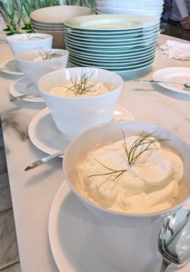 More bowls of crème fraîche are placed on the table in case anyone wants more. Crème fraîche, French for “fresh cream,” is a thick cultured cream often used as a finishing touch for sauces and soups, or spooned over fruit or warm desserts such as cobblers.